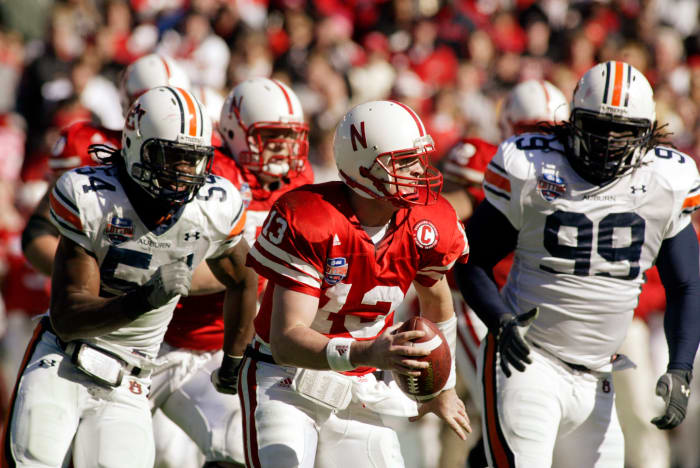 Nebraska quarterback Zac Taylor evades the Auburn pass rush.